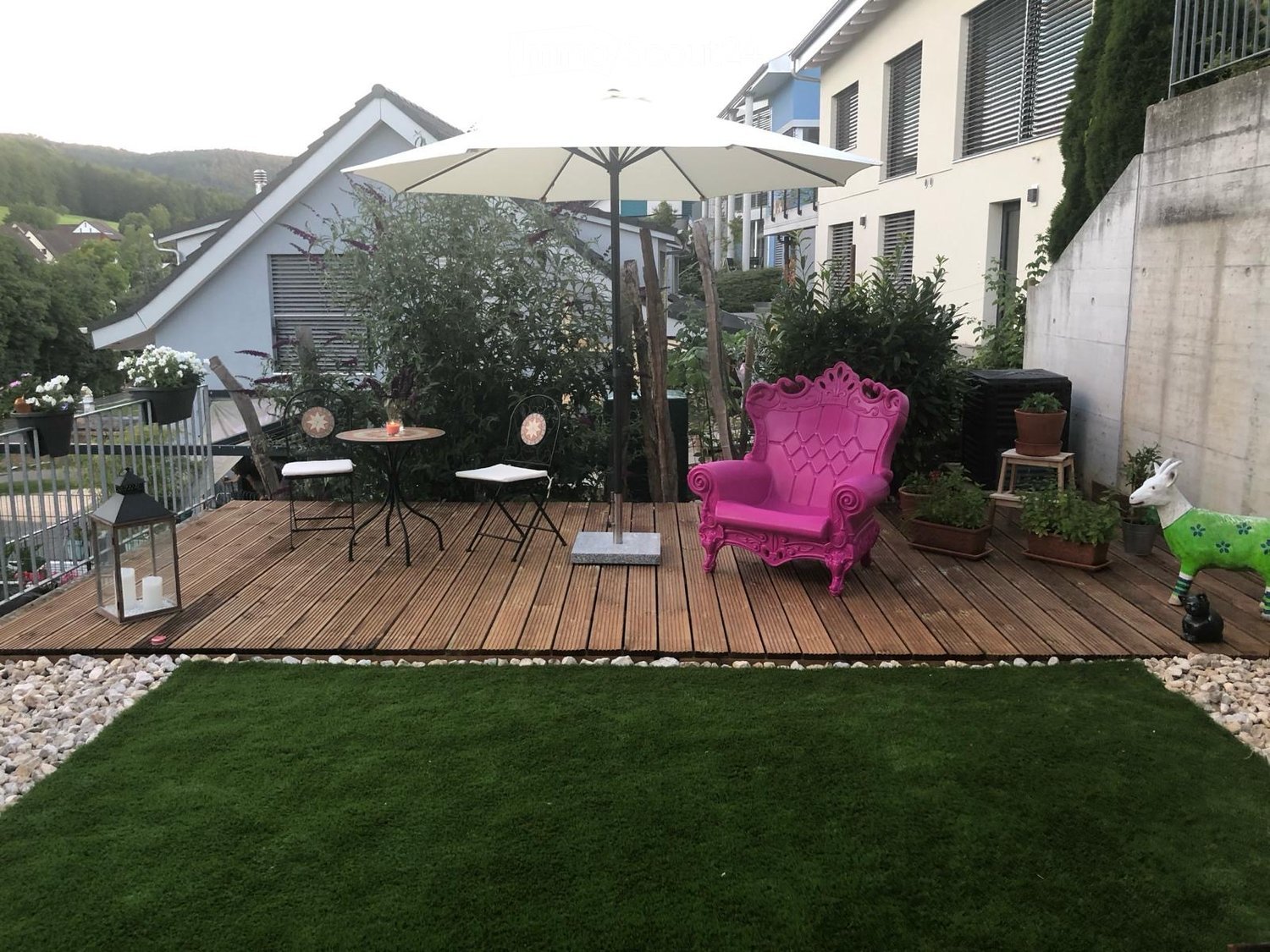 Other. {"type": "Garden / Outdoor Area", "objects": ["table", "chair", "umbrella", "chair", "stool", "stool", "stool", "stool", "stool", "stool", "stool", "stool", "stool", "stool", "stool", "stool", "stool", "stool", "stool", "stool", "stool", "stool", "