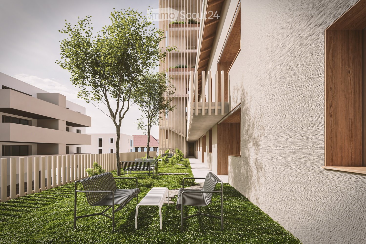 Garden / Outdoor Area. Modern outdoor seating area with two chairs and a bench on artificial grass, surrounded by contemporary buildings and trees.