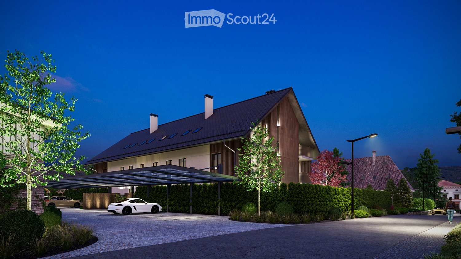 Modern two-story house with a sloped roof, wooden facade, and covered driveway. Features include a garage, landscaped garden, and parked cars.