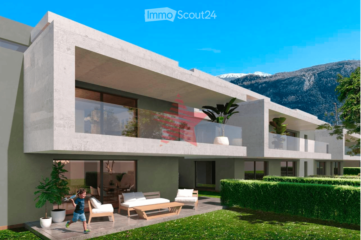 Modern two-story house with large windows, balconies, and a well-maintained garden area with lounge chairs and a small seating area.