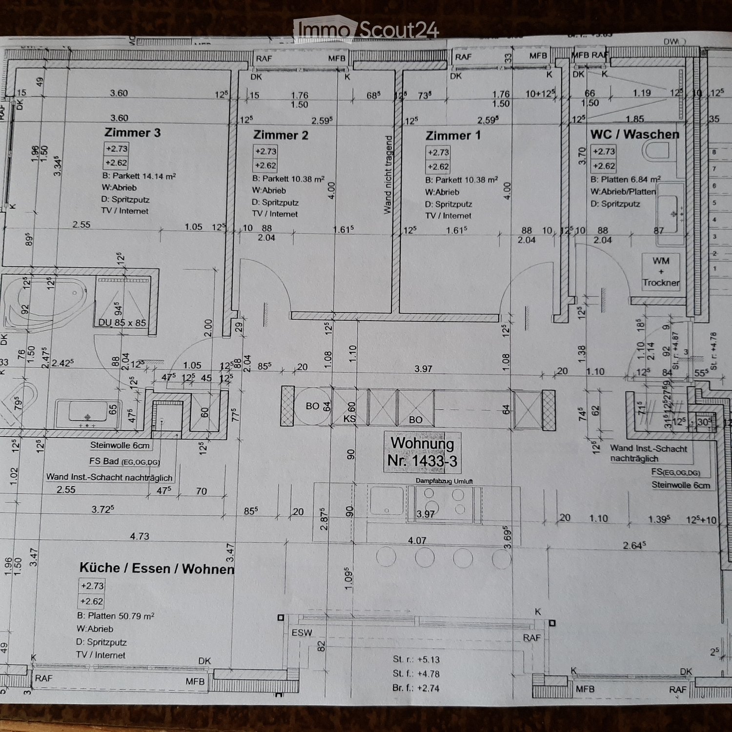 Floor plan of apartment number 1433-3, showing three bedrooms, a kitchen/dining/living area, a bathroom, and a WC/washing area. Includes measurements, wall thicknesses, and technical details.