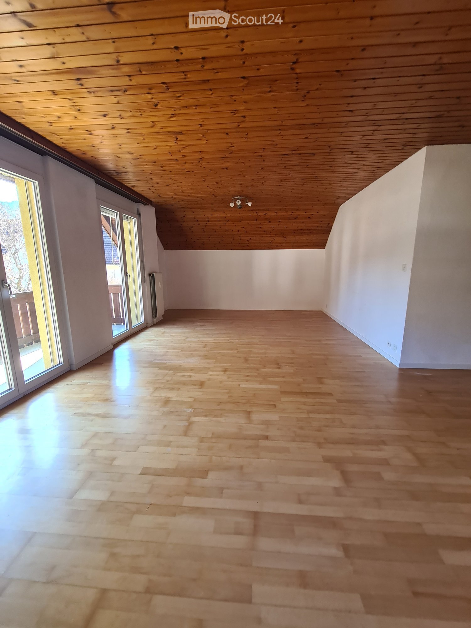 empty room, wooden floor, wooden ceiling, sliding glass doors, balcony