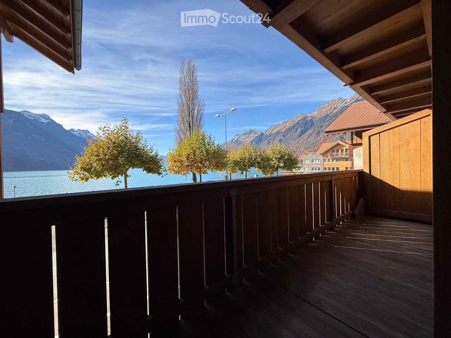 wooden balcony, wooden railings, mountain view, water view
