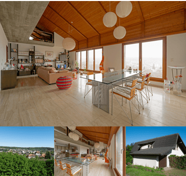 Modern, open-plan living and dining area with wooden floors, large windows, a sofa, a coffee table, a glass dining table with chairs, a bookshelf, and a colorful ball on the floor.