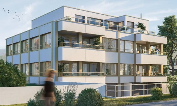 Modern multi-story apartment building with large windows, balconies, and contemporary design.
