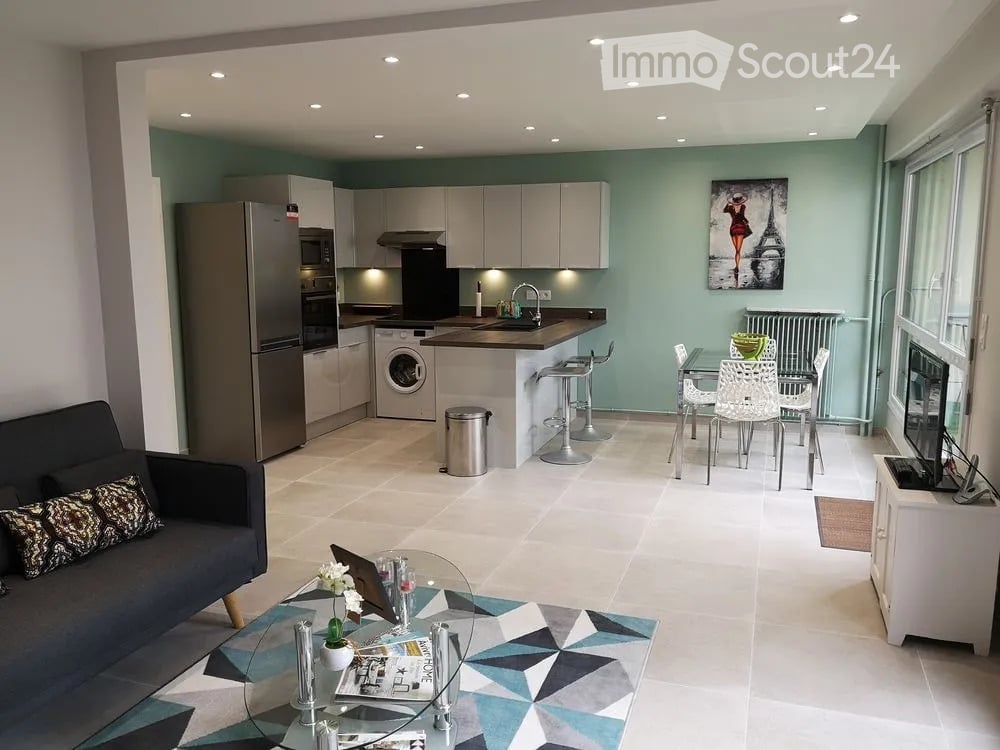 {"visible_features": [], "type": "Furnished Room", "objects": ["sofa", "coffee table", "laptop", "stool", "chair", "table", "fridge", "microwave", "oven", "washing machine", "stool", "stool", "stool", "stool", "stool", "stool", "stool", "stool", "stool",
