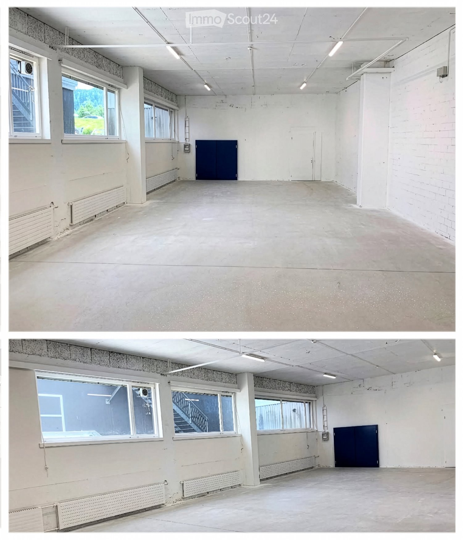 Empty room with concrete floor, white walls, large windows, and a blue door.