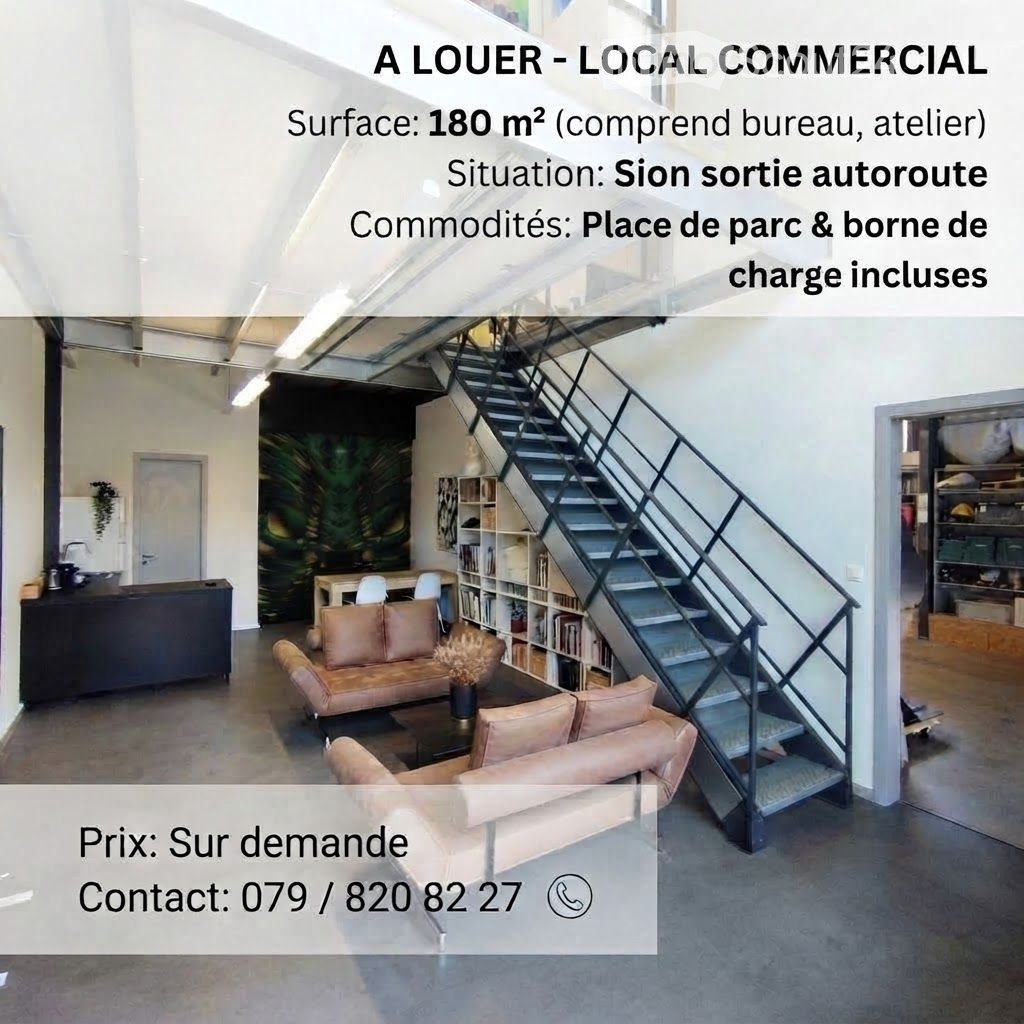 Modern, open-plan commercial space with a staircase leading to an upper level, featuring a sofa, coffee table, bookshelf, and reception desk.
