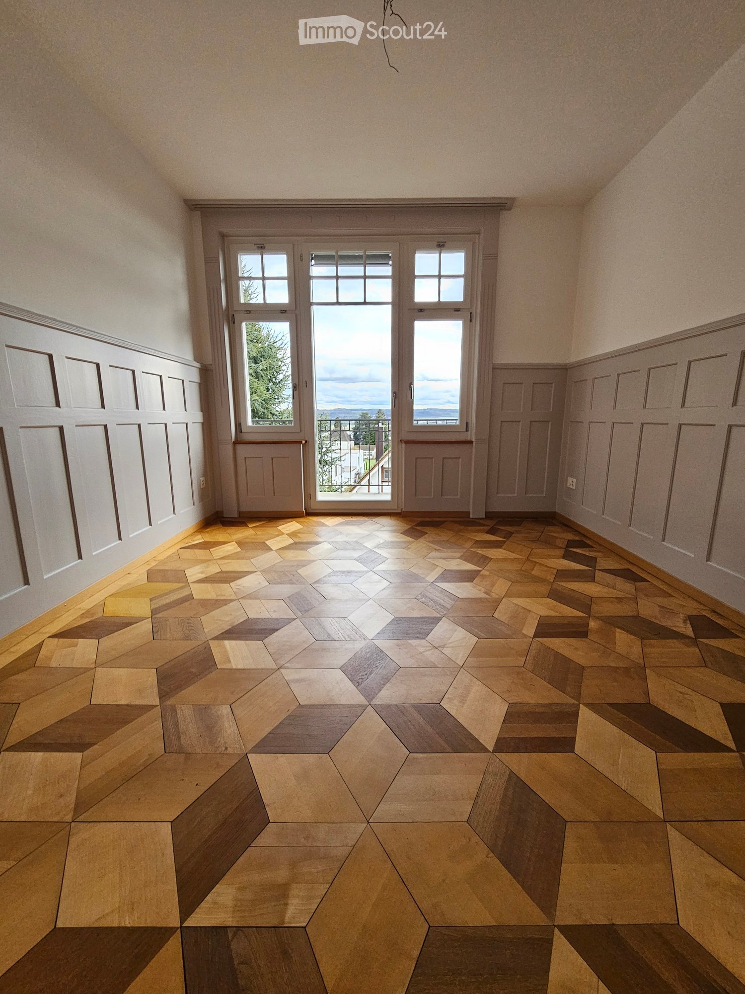 empty room, hardwood floors, white walls, large windows, balcony