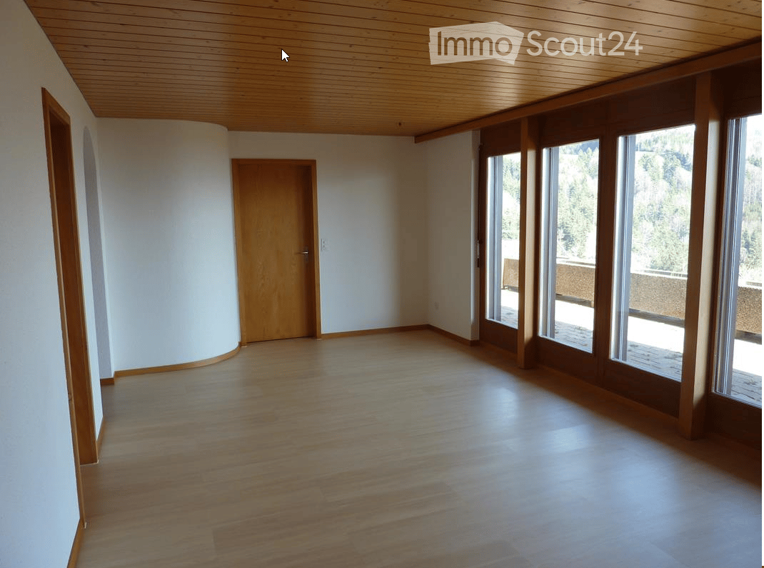 empty room, hardwood floors, wooden ceiling, large windows, balcony with view