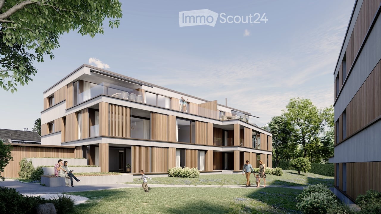 Modern multi-story residential building with wooden and white exterior walls, large windows, multiple balconies, greenery around, family walking in front