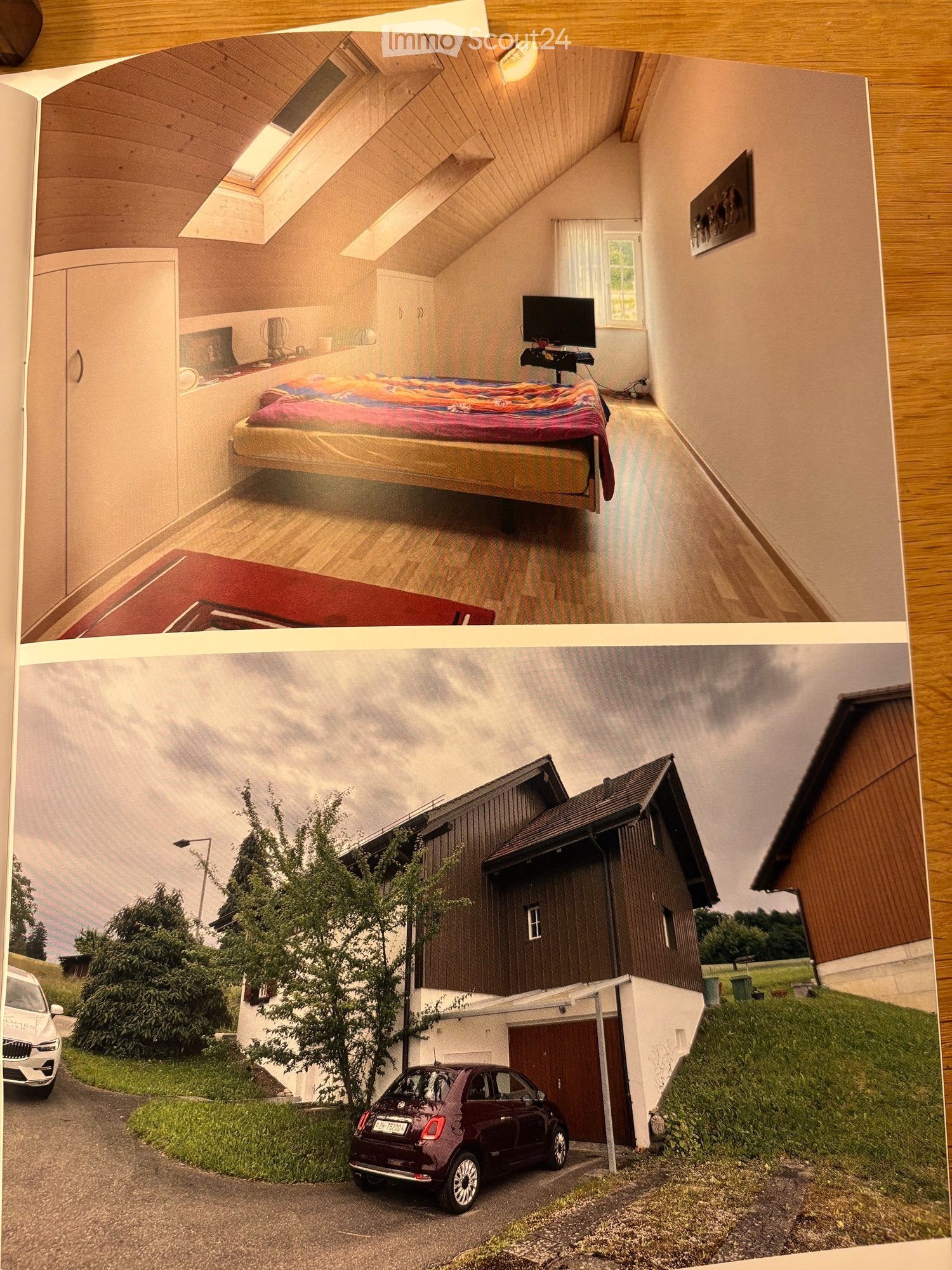 The image shows a two-page spread featuring a modern bedroom with a raised bed and a view of a contemporary house exterior with a garage and parked cars.