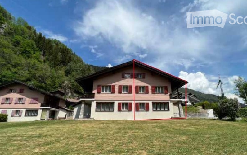 2-story house, red shutters, red roof, mountain in background