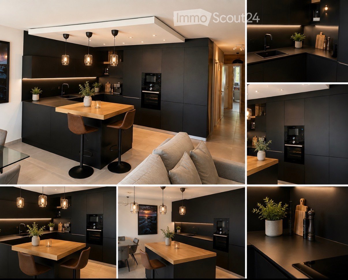 Modern kitchen with black cabinetry, a central island with wooden countertop, pendant lights, and bar stools. Includes sink, oven, microwave, and decorative plants.
