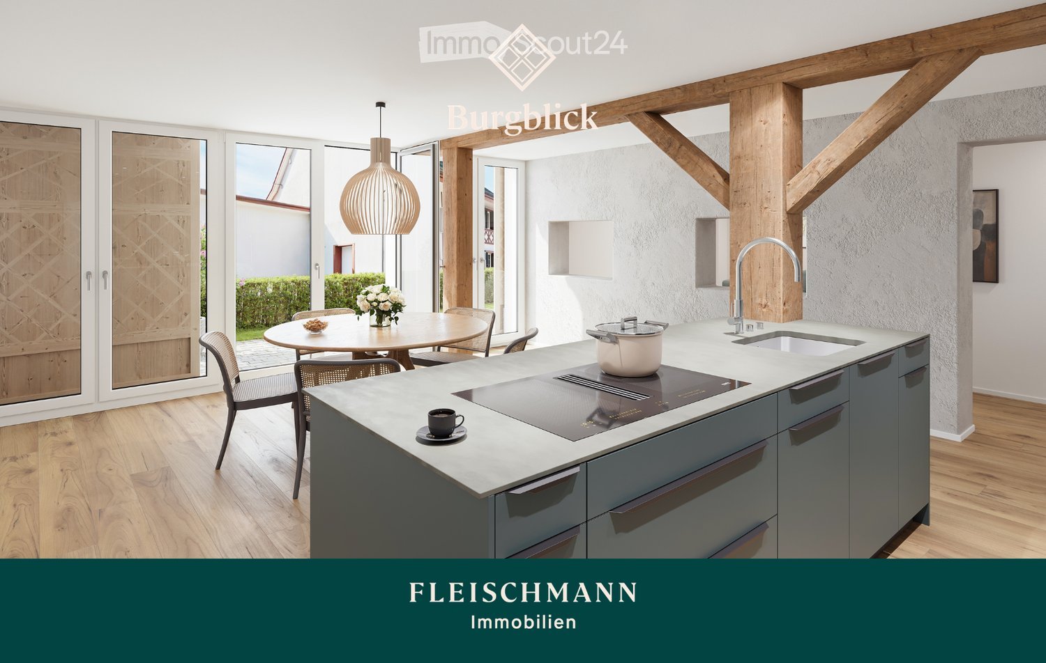Modern kitchen with grey cabinets, white countertops, island with induction cooktop, sink, and pendant light. Dining area with round table, chairs, and flower vase.