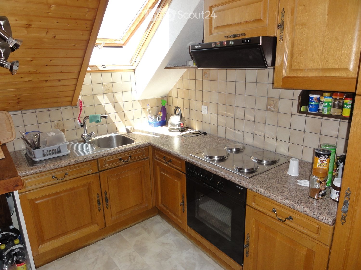 {"type": "Kitchen", "objects": ["sink", "faucet", "oven", "stove", "cabinets", "dish rack", "cupboard", "oven hood", "cup", "bottle", "cupboard", "oven", "faucet", "oven", "oven", "oven", "oven", "oven", "oven", "oven", "oven", "oven", "oven", "oven", "ov