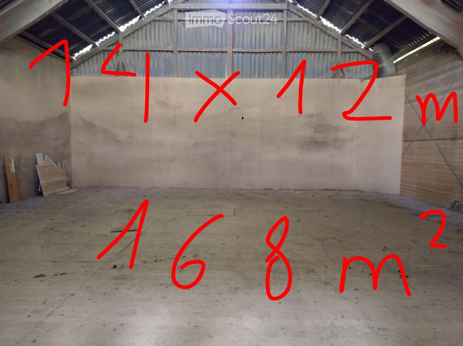 Empty room with bare walls and concrete floor, no furniture or equipment.