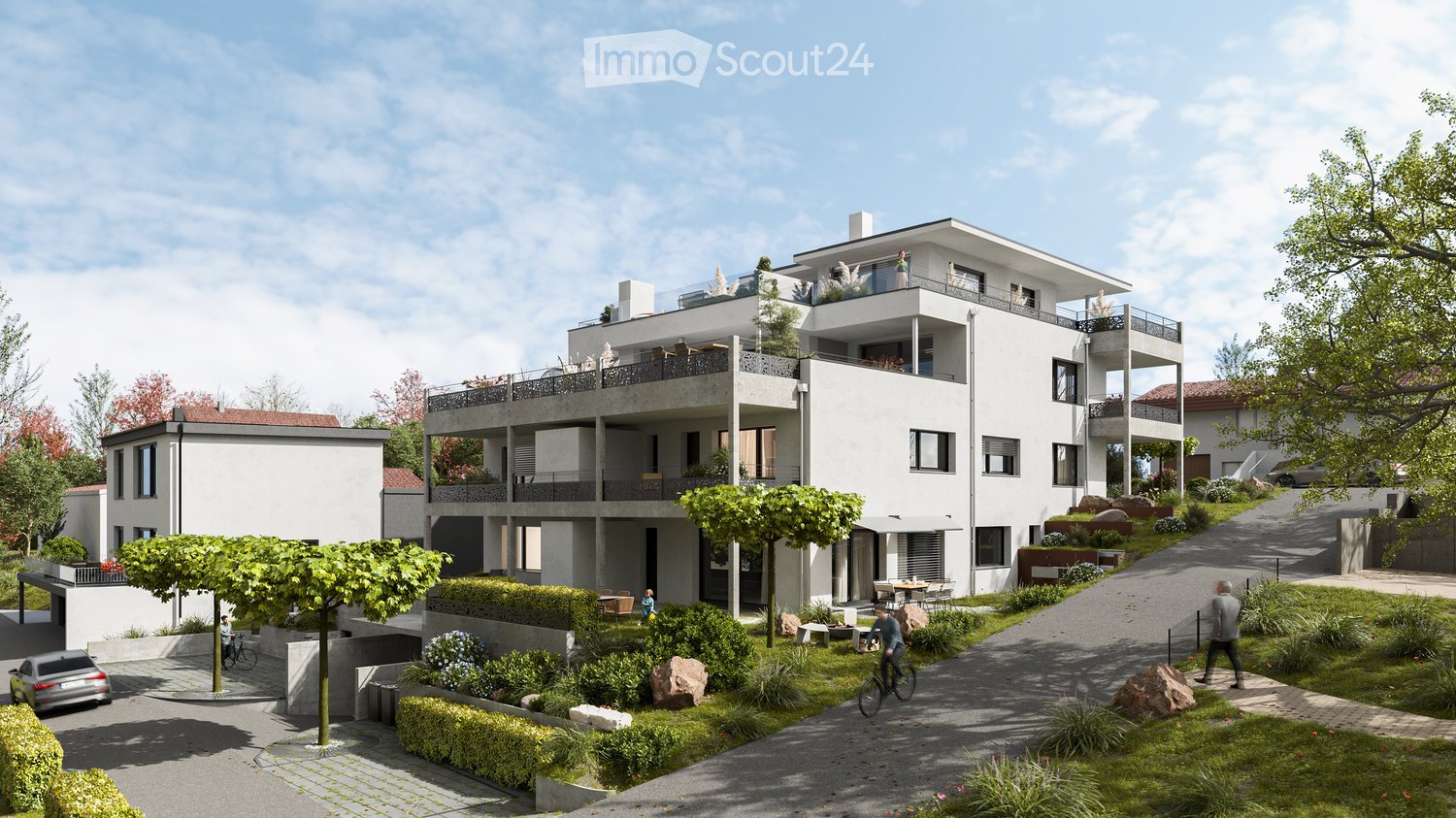 Modern multi-story residential building with balconies, surrounded by greenery and pathways.