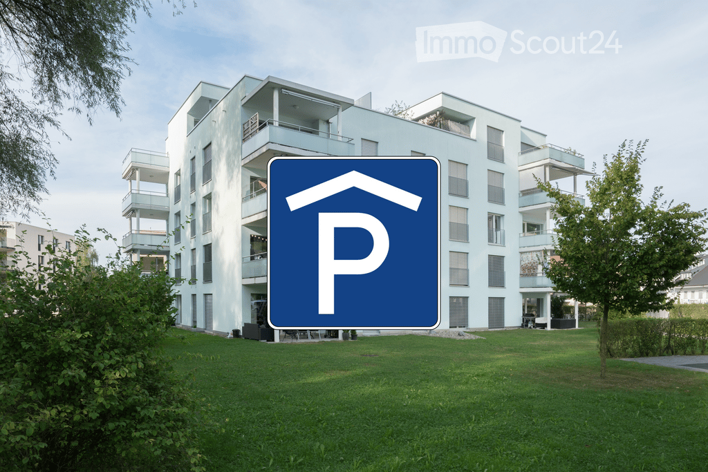 Modern multi-story residential building with balconies and a parking sign in the foreground.