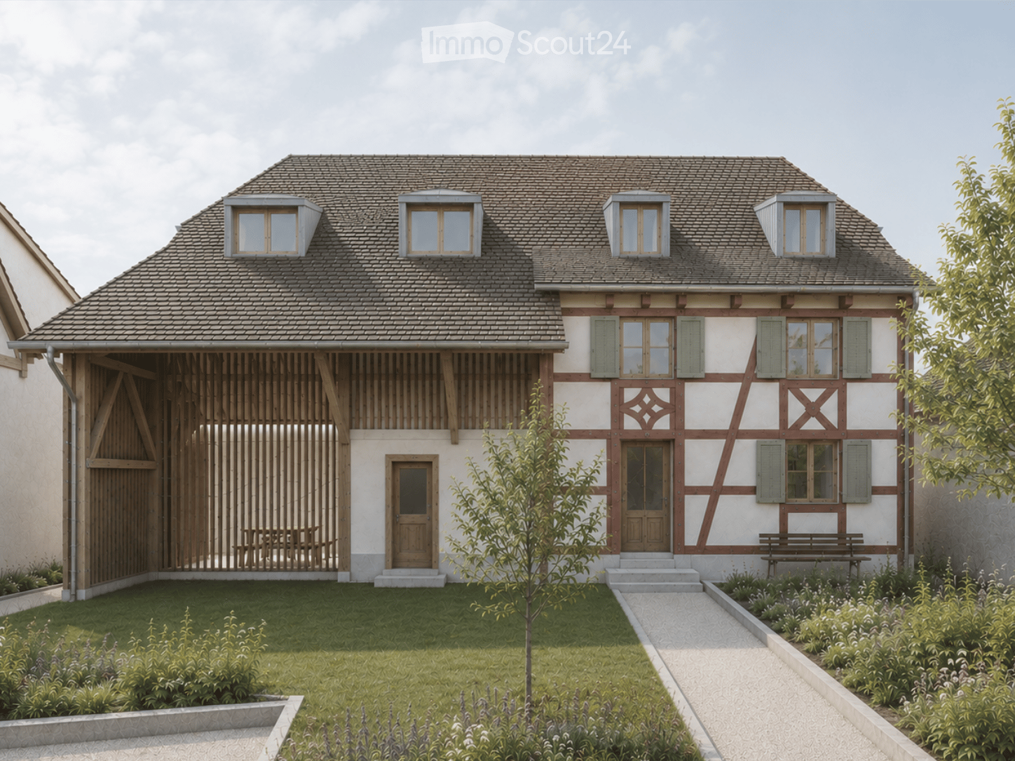 Two-story house with a traditional half-timbered facade, grey tiled roof, multiple windows, and a wooden garage. The front yard features a well-maintained lawn, garden beds, and a pathway leading to the entrance.