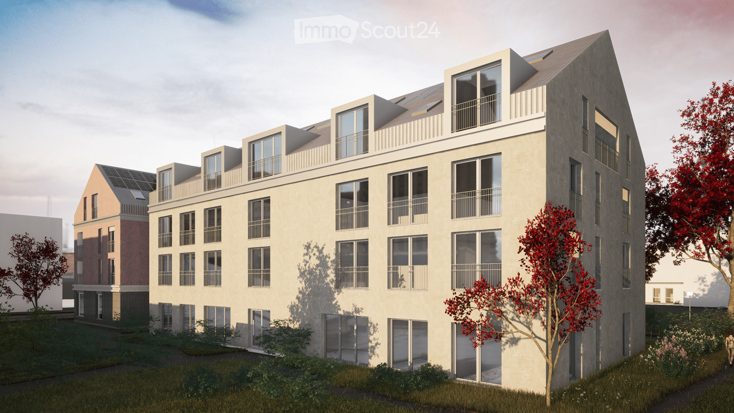 Modern multi-story residential building with large windows, balconies, and contemporary design. Features include a flat roof, solar panels, and surrounding greenery.