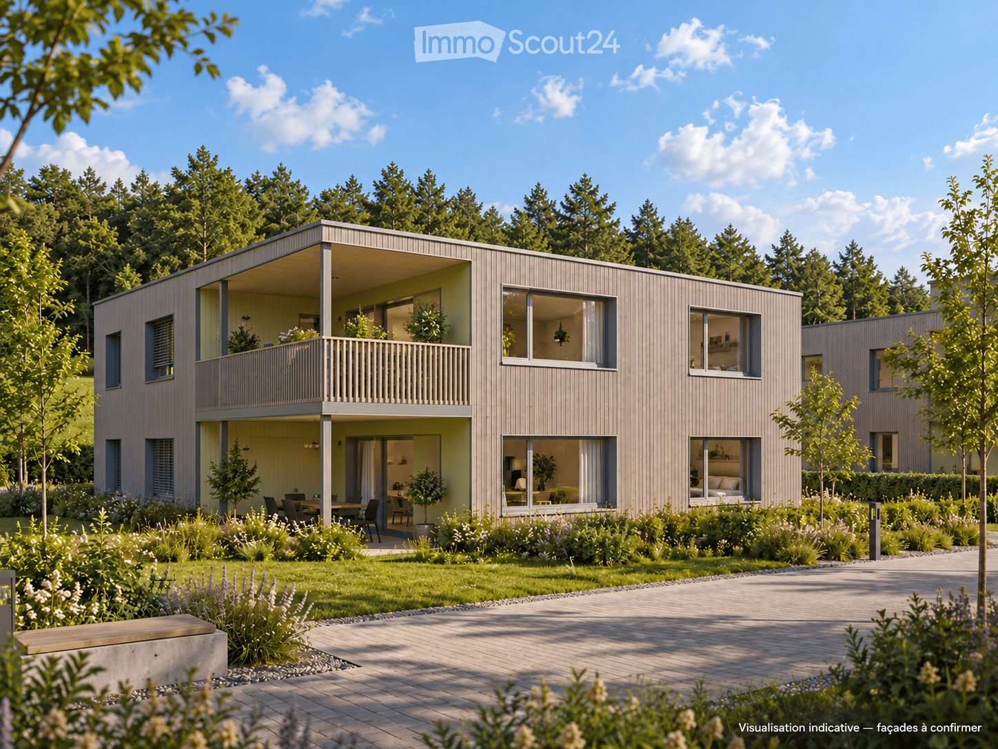 Modern two-story house with light wood exterior, large windows, and a spacious balcony on the upper level. The house is surrounded by a well-maintained garden with various plants and a paved pathway leading to the entrance.