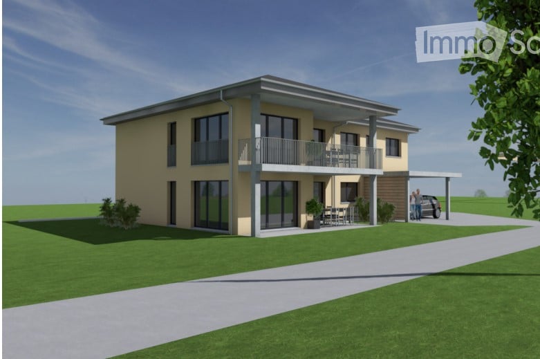 Two-story modern house with a balcony, large windows, and a parking area. The house features a light yellow facade and is surrounded by a well-maintained lawn.