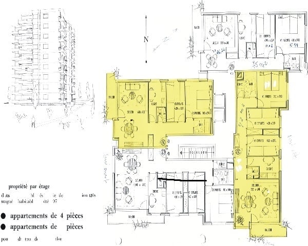 Floor plan of a multi-unit residential building showing multiple apartments, common areas, and staircases.