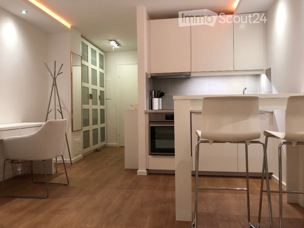{"type": "Furnished Room", "objects": ["stool", "stool", "stool", "chair", "mirror", "oven", "faucet", "cabinet", "cabinet", "cabinet", "cabinet", "cabinet", "cabinet", "cabinet", "cabinet", "cabinet", "cabinet", "cabinet", "cabinet", "cabinet", "cabinet"
