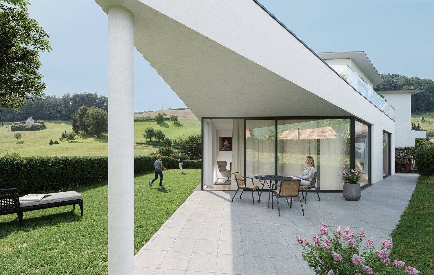 Modern house with patio, large windows, and grassy yard