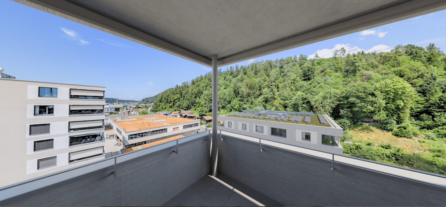 An exterior balcony with metal railings, surrounded by green hills with residential buildings. Two-story building with large windows and solar panels on the roof.