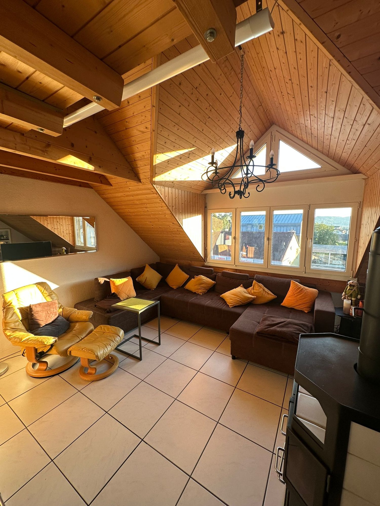 sofa, coffee table, wooden ceiling, fireplace
