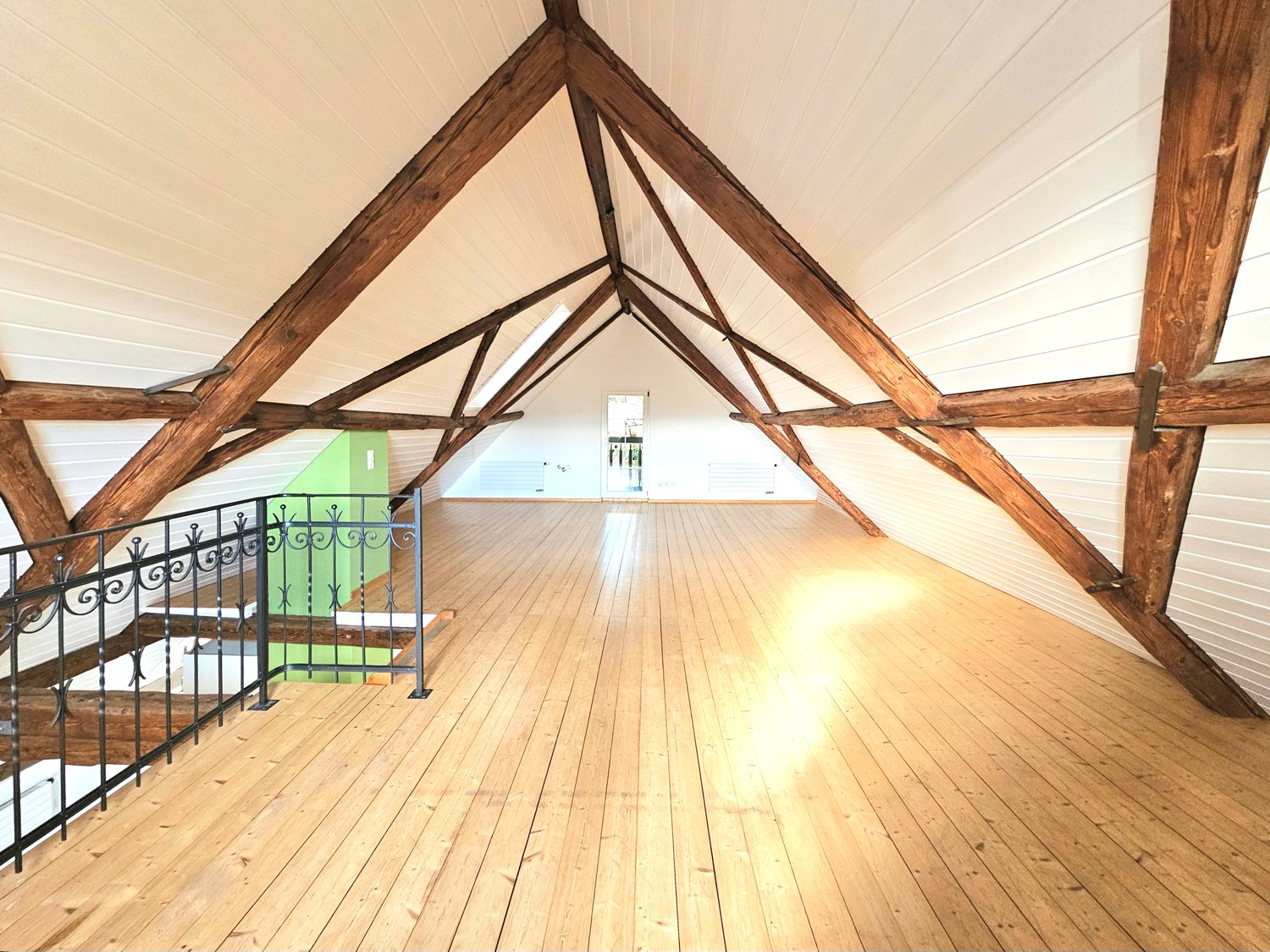 wooden floors, wooden beams, stairs, empty room