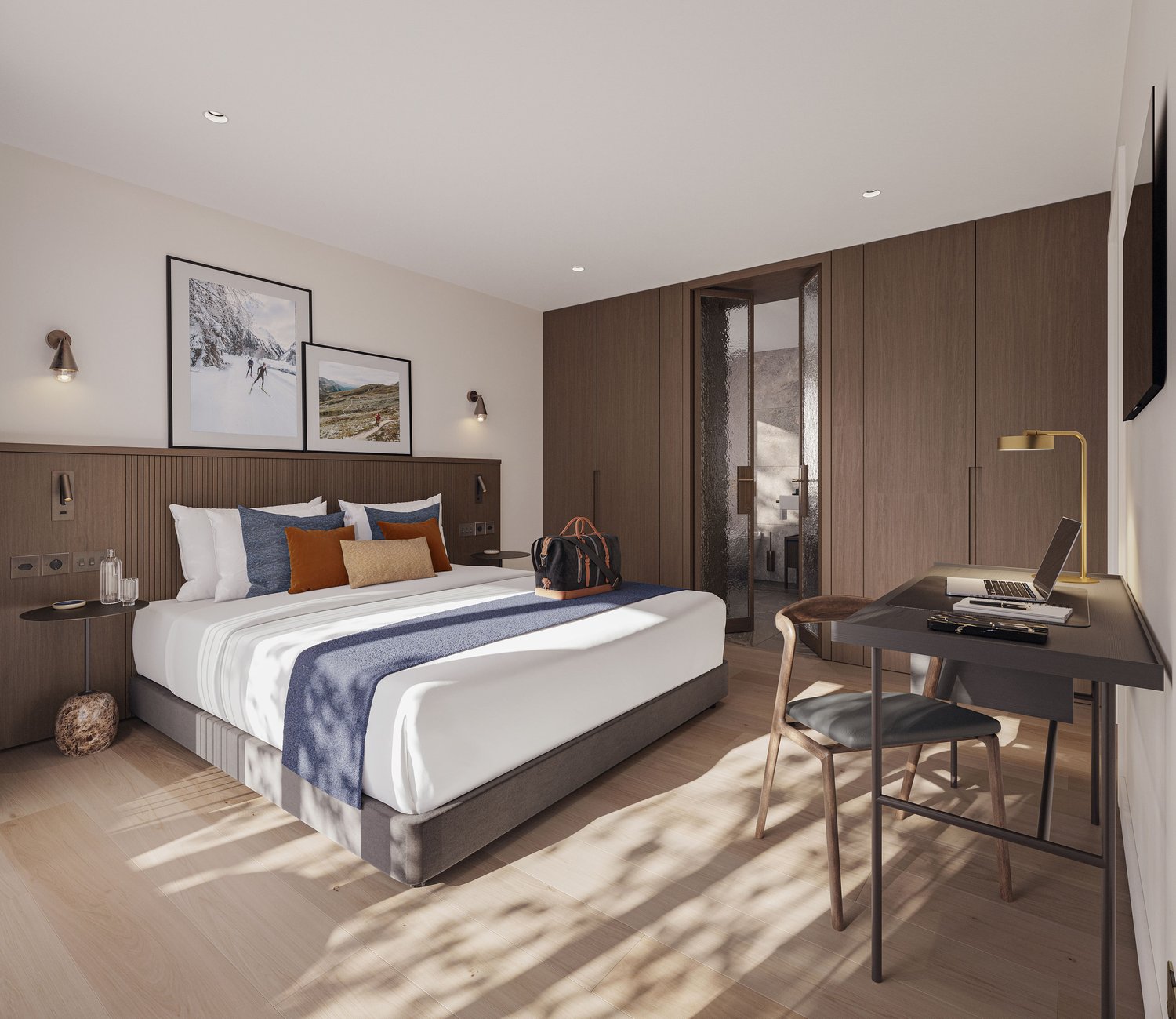 Wooden floor, large bed, bedhead with cabinets, desk, chair, lamps, table