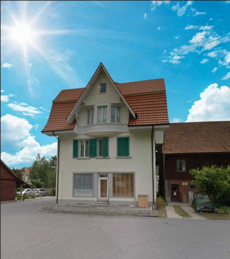 2 story house, red tiled roof, green shutters, small balcony, front porch, brick walls, brown door, parked car