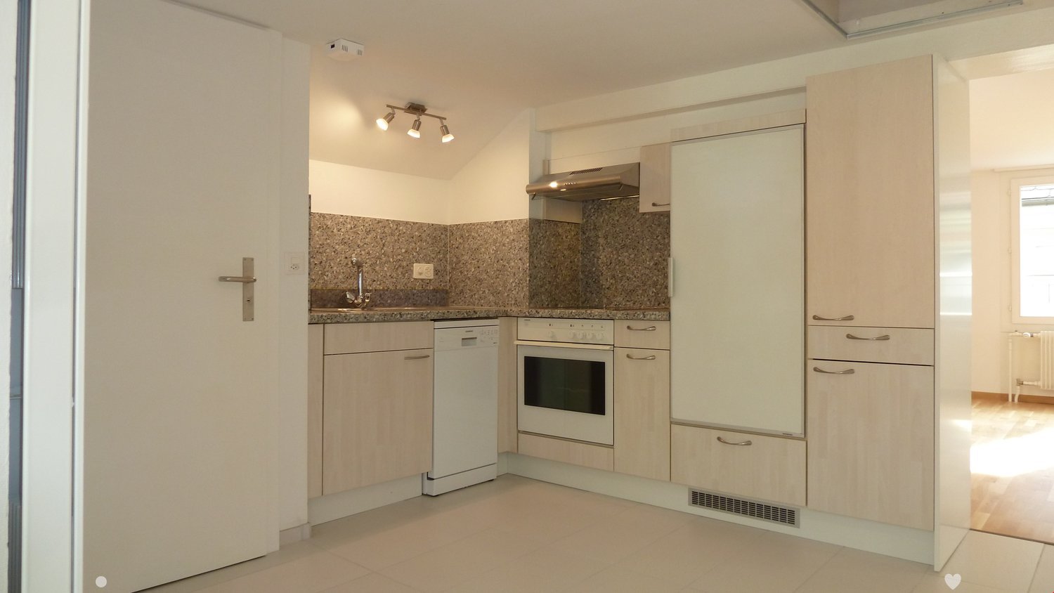 modern kitchen with white appliances, granite countertops, wooden cabinets, tiled floor