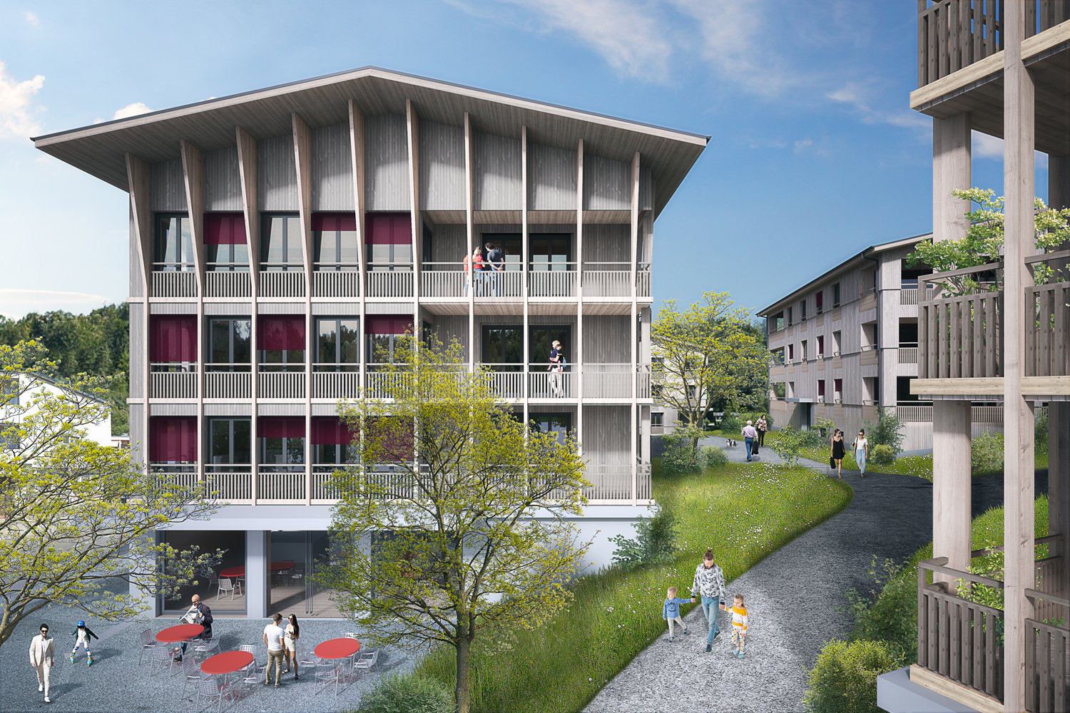 Modern apartment building with multiple balconies, large windows, and a central courtyard.