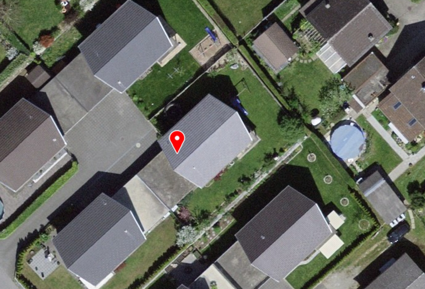 detached houses, gray roofs, driveways, garages