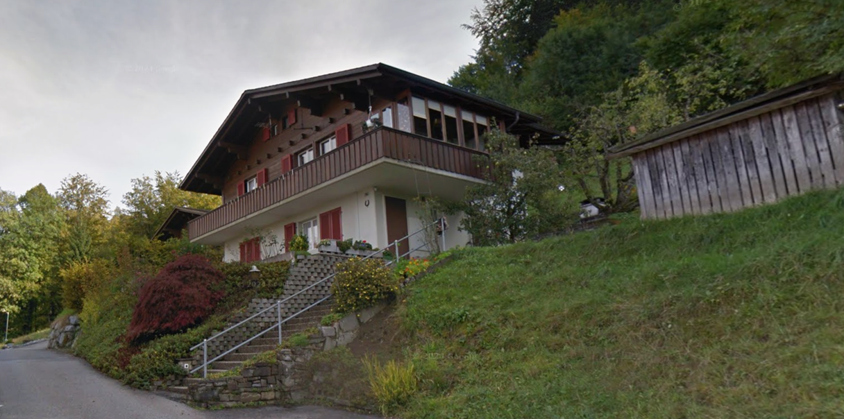 2 story house, brown and white, balcony, stairs, garden, trees