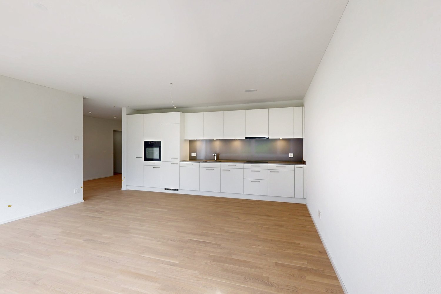 kitchen with oven, sink, dishwasher, tiled floors, white walls