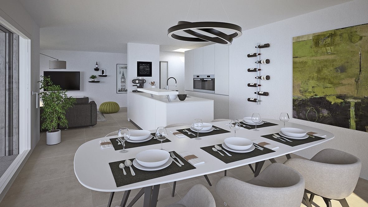 The image shows a modern, open-concept kitchen and dining area. The kitchen features white cabinets, a large island with a sink, and high-end appliances including a dishwasher. The dining area has a large, oval-shaped table with white chairs and place set