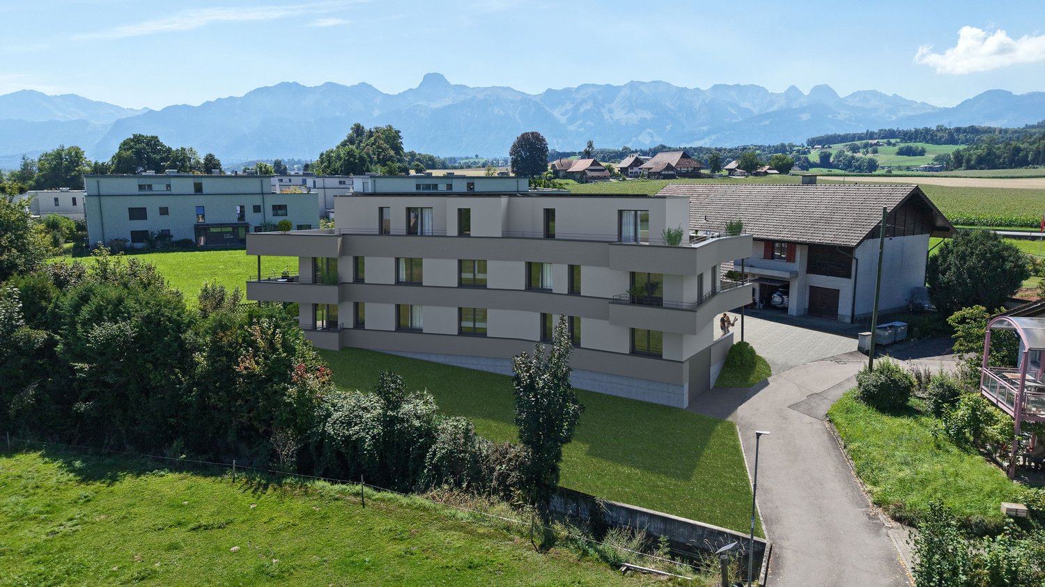 modern 3 story building, multiple windows, two balconies, driveway