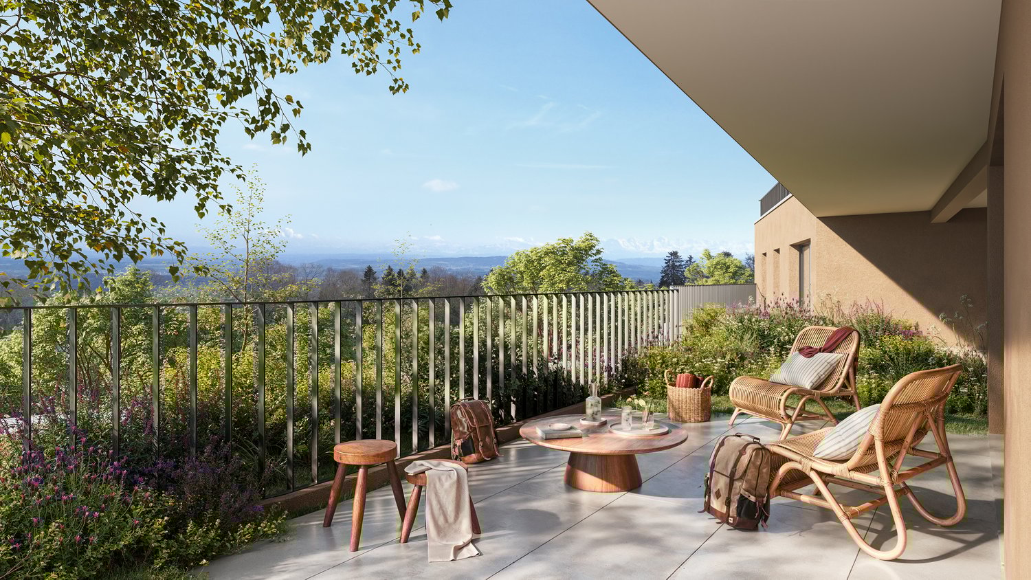 Modern balcony with a black railing, wooden table, wicker chairs, wooden stools, bags, greenery with flowers, clear sky, and mountains in the distance.