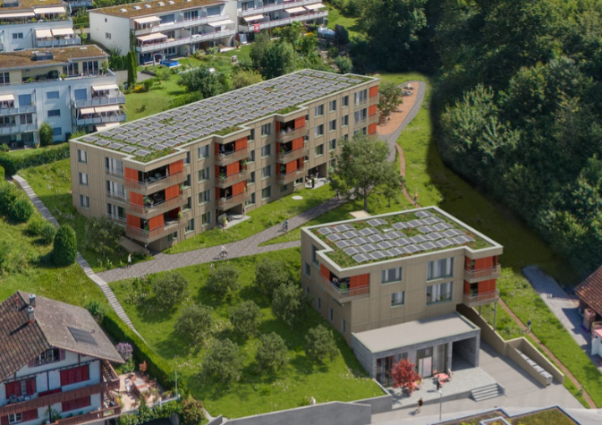 solar panels, two separate buildings, green surroundings, pathways, solar roof panels