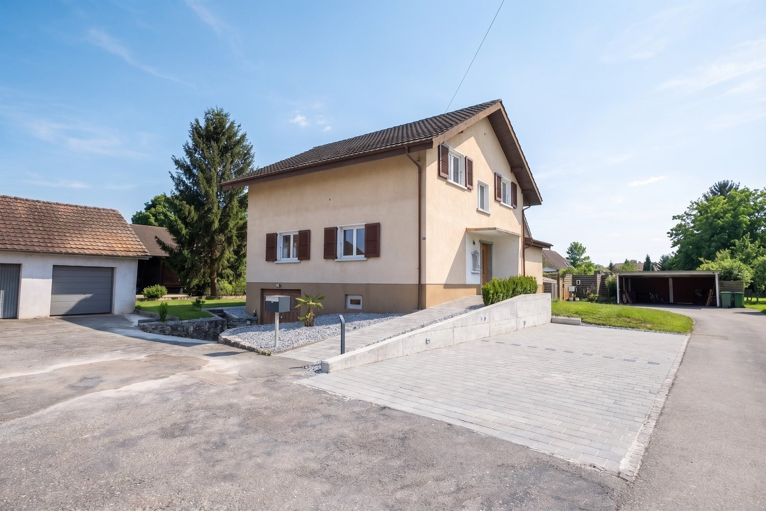 2 story house, brown roof, beige walls, 2 garages, driveway, mailbox