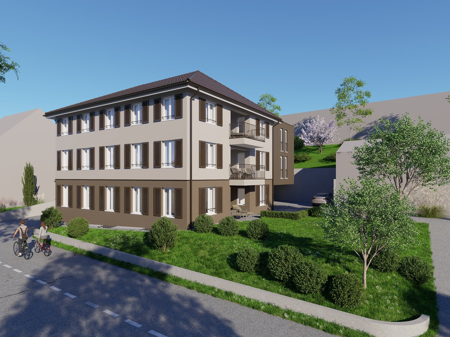 Three-story building, beige and brown exterior, multiple windows, two balconies, parking area, front lawn, sidewalk