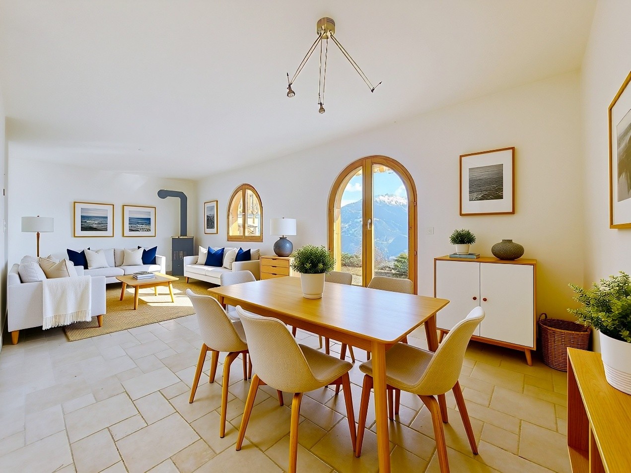 Dining room with a wooden table, white chairs, a white couch, a white cabinet, a wooden floor, and a chandelier