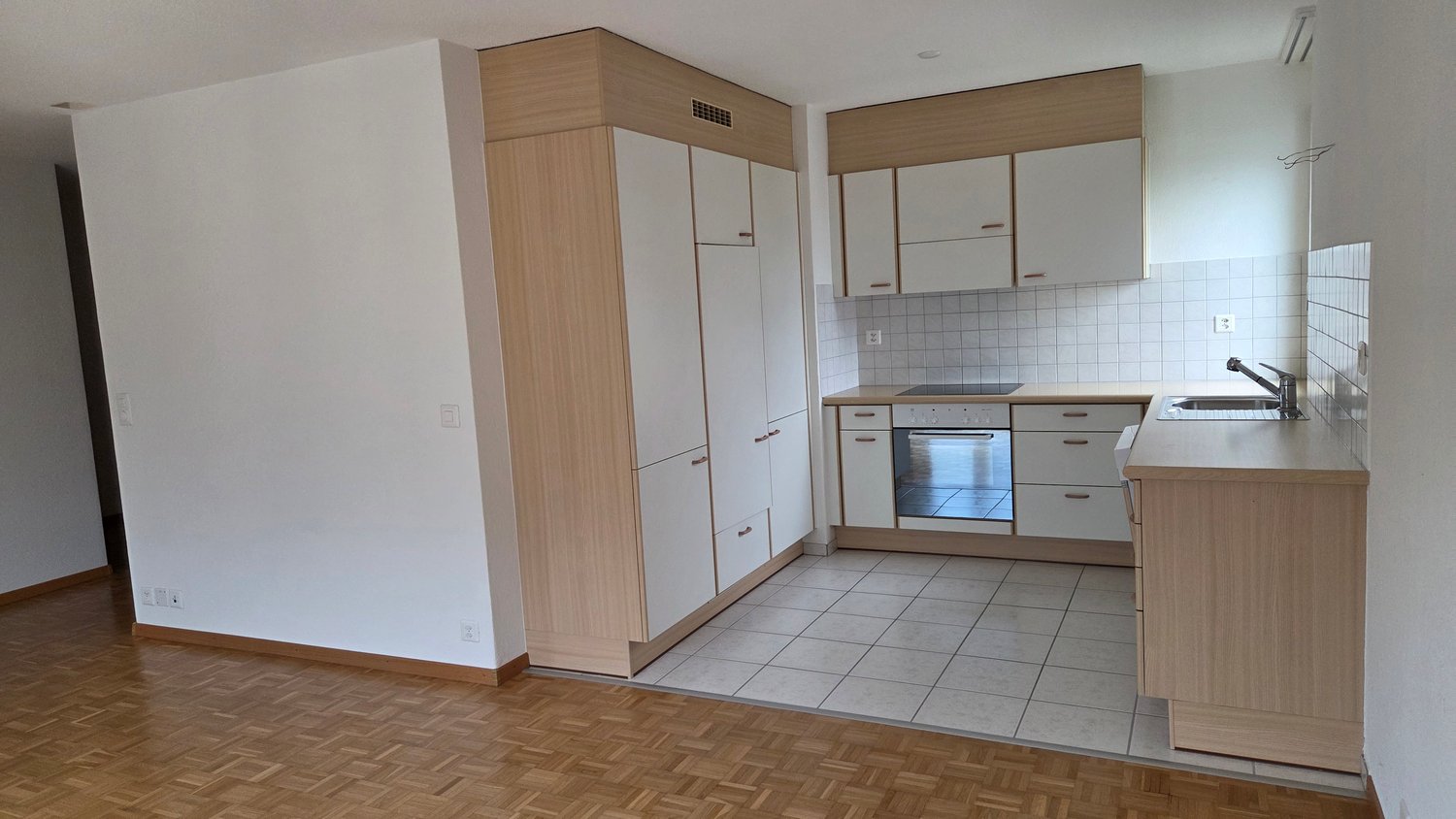 modern kitchen with wooden cabinets, tiled flooring, dishwasher, washing machine, gas stove, sink, modern appliances