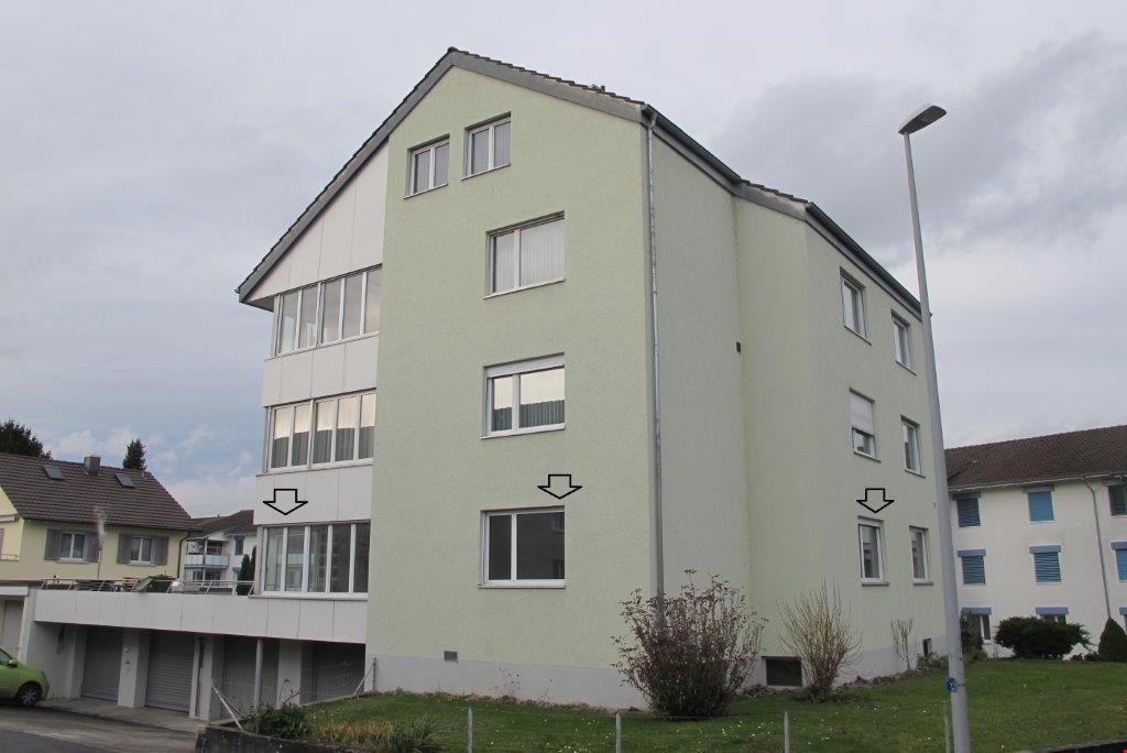 4-story residential building, balcony on the first floor, garage in the ground floor