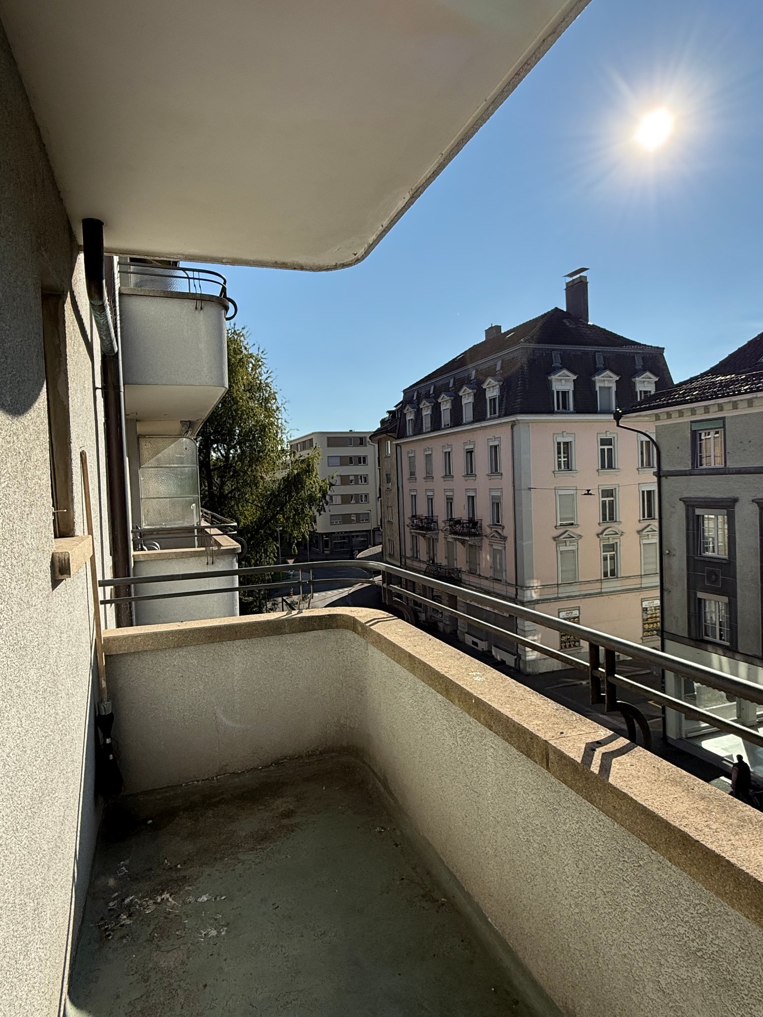 large balcony, metal railing, good city view
